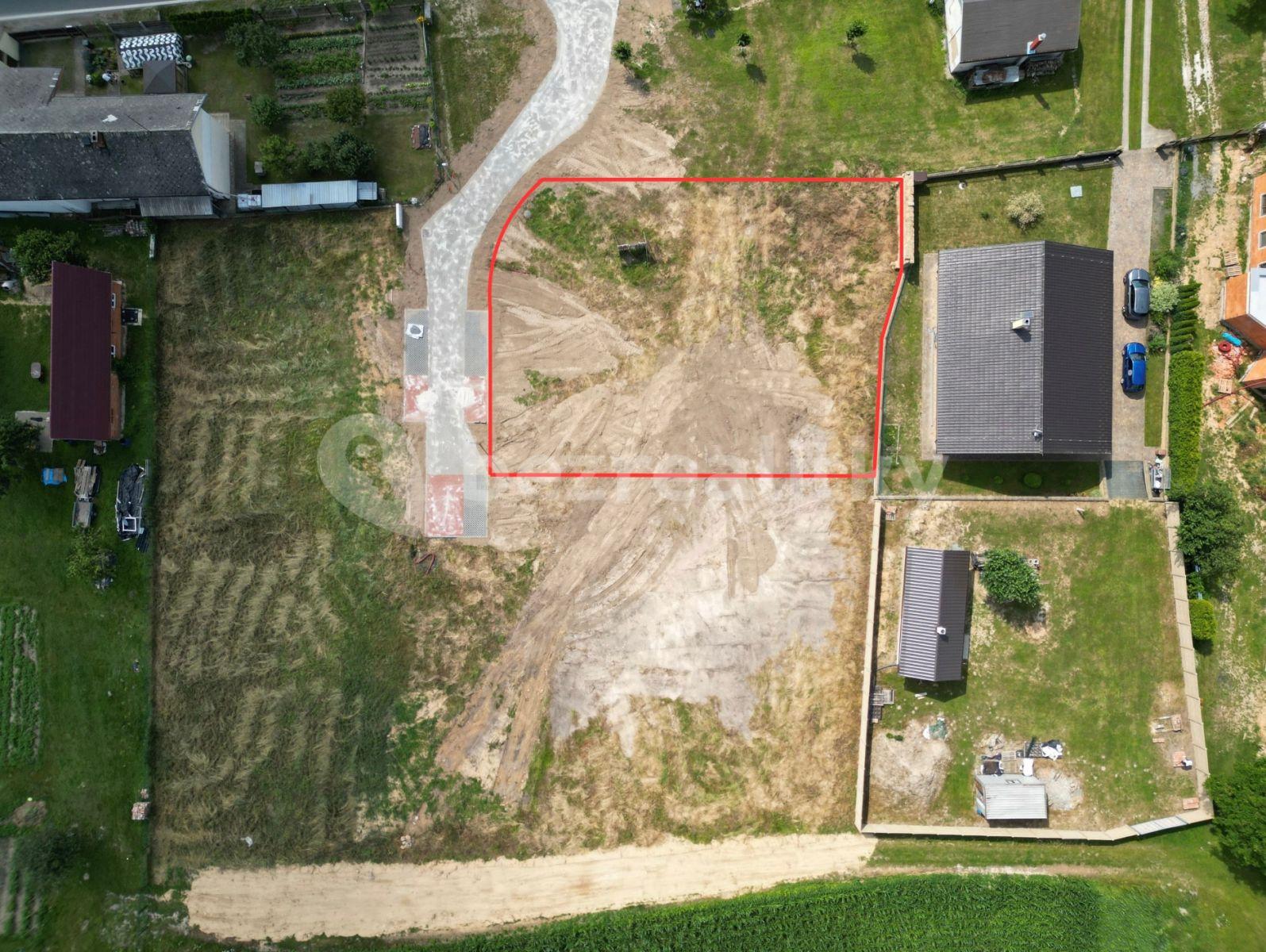 Prodej pozemku 1.051 m², Plužná, Středočeský kraj